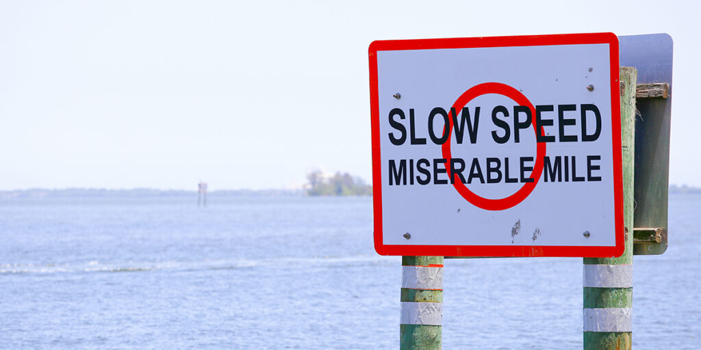 a slow speed sign along the miserable mile in florida